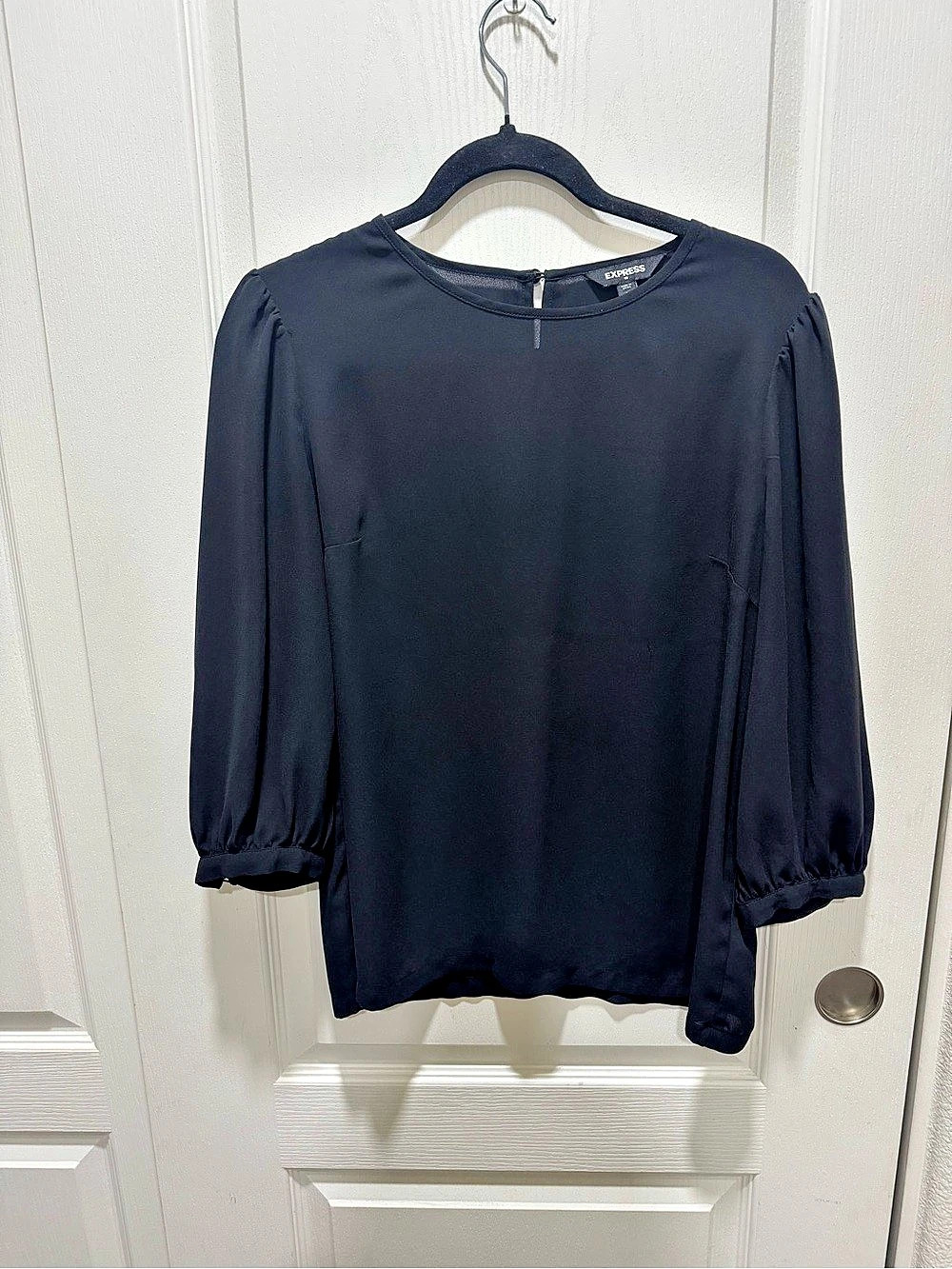 Poshmark Title:
Express Women’s Black Puff Sleeve Blouse 3/4 Sleeve Size M